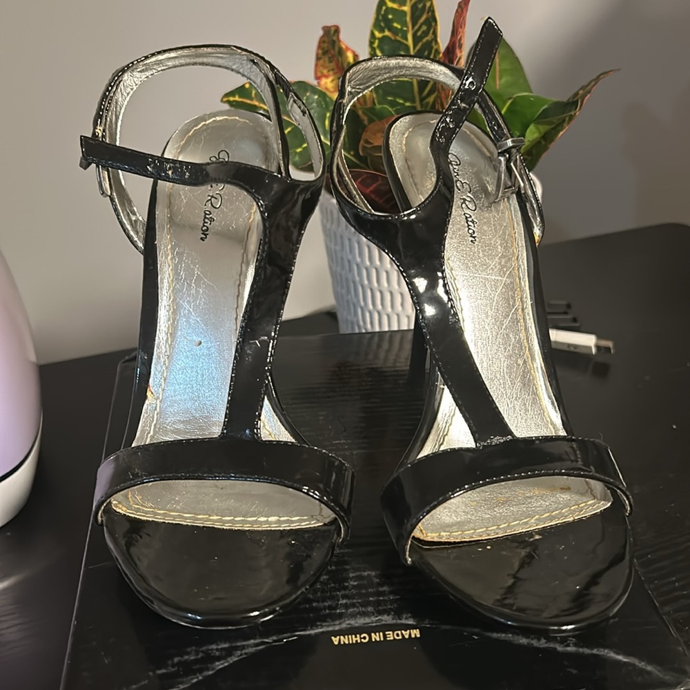 Women’s high heels, stiletto black patent leather scrappy pump